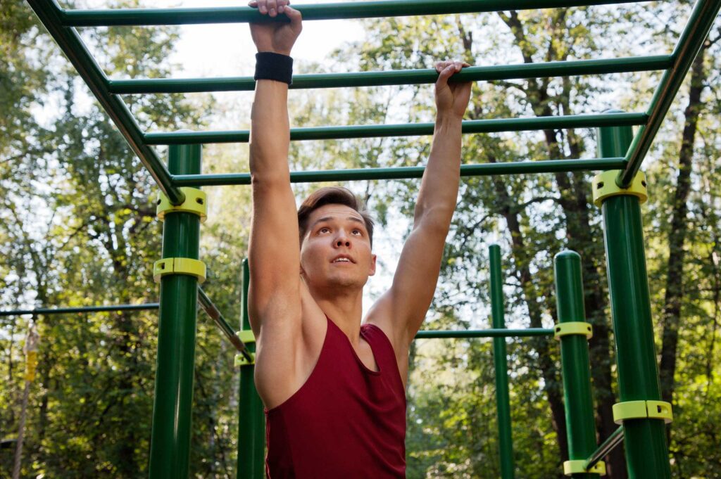 A parent working out at the playground